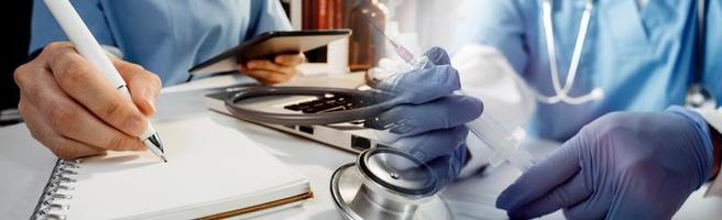Double exposure of technology healthcare And Medicine concept. Doctors using digital tablet and modern virtual screen interface icons panoramic banner, blurred background. photo