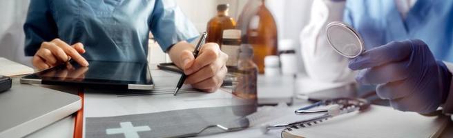 Double exposure of technology healthcare And Medicine concept. Doctors using digital tablet and modern virtual screen interface icons panoramic banner, blurred background. photo