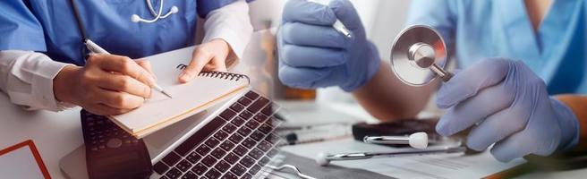 Medicine doctor and stethoscope touching icon medical network connection with modern interface on digital tablet in hospital background. Medical technology network concept photo