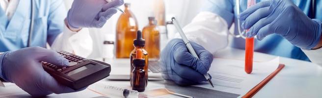 Medicine doctor and robotics research and analysis. Diagnose checking coronavirus or covid-19 testing result with virtual screen in laboratory, Inhibition of disease outbreaks and Medical technology photo