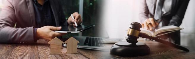 Business and lawyers discussing contract papers with brass scale on desk in office. Law, legal services, advice, justice and law concept picture with film grain effect photo