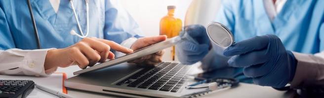 Double exposure of technology healthcare And Medicine concept. Doctors using digital tablet and modern virtual screen interface icons panoramic banner, blurred background. photo
