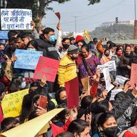 New Delhi, India December 25 2021 - Delhi Contractual Guest Teachers with posters, flags and graffitis protesting against Delhi AAP Government for making policy, Delhi Guest Teachers protesting photo