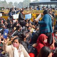 New Delhi, India December 25 2021 - Delhi Contractual Guest Teachers with posters, flags and graffitis protesting against Delhi AAP Government for making policy, Delhi Guest Teachers protesting photo