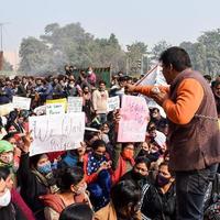 New Delhi, India December 25 2021 - Delhi Contractual Guest Teachers with posters, flags and graffitis protesting against Delhi AAP Government for making policy, Delhi Guest Teachers protesting photo