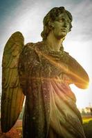 Guardian angel and sunbeams - concept of faith and religion photo