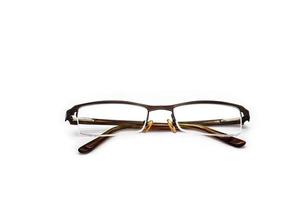 Brown frame eye glasses isolated on white background photo