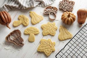 Baking cookies in the form of pumpkin and leaves photo