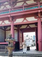 Tokyo, Japan on April 15, 2019. An old man prays at a temple in Japan. photo