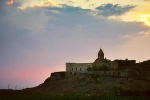 Historical landmark in Armenia - Khor Virap monastery with Ararat mountain peak background at sunrise photo