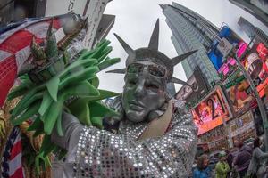 NEW YORK - USA  APRIL 22 2017 times square human statue of liberty photo