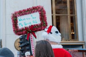 NEW YORK, USA - DECEMBER 10, 2011 - People deressed as santa claus celebrating xmas photo