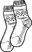 Black engraved knitted socks drawing. Garment for the foot ink hand drawn  sketches, separate design elements vector