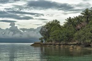 puesta de sol paraíso tropical foto