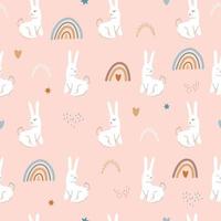 Cute seamless pattern of bunnies and boho rainbows