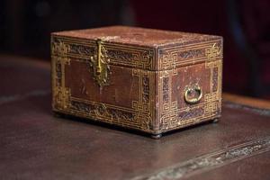 old ancient secret casket on a desk photo