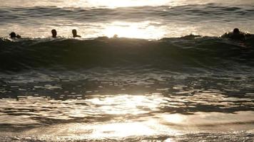 Tourists enjoy summer vacation on the Nai Harn beach, Phuket, Thailand video