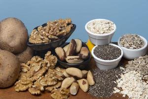 Food as a source of minerals such as zinc, magnesium, copper and selenium - chia seeds, sunflower seeds, nuts, chestnuts photo