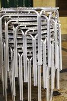 Stacked metal chairs photo