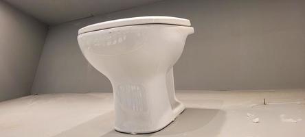 white toilet that can be used as a flat photo