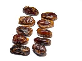 Dates on a white background. Delicious dried fruits. photo