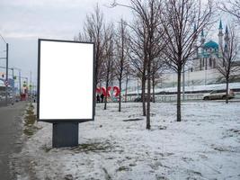 Blank advertising billboard. Advertising space on a busy street. photo