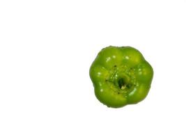 Dolma pepper on a white background. A juicy beautiful vegetable. Green sweet pepper. photo