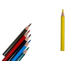 colored short pencils. Wooden pencils are laid out on a white background. photo