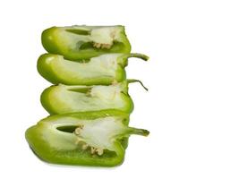 Sliced dolma pepper on a white background. A juicy beautiful vegetable. Green sweet pepper. photo