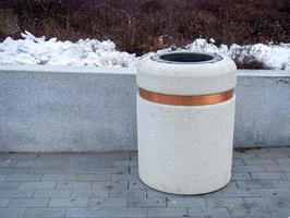 stone trash can. Caring for ecology. Trash can design photo