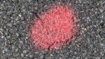 Detailed view on asphalt surfaces of different streets and roads with cracks photo