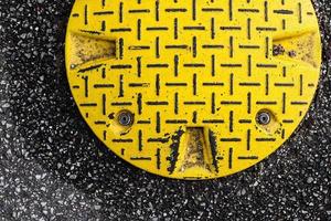 Detailed view on asphalt surfaces of different streets and roads with cracks photo