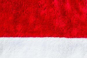 Close up red and white Santa Claus hat texture to backround photo