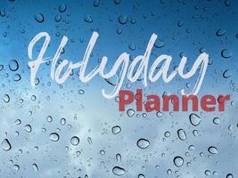 Happy Holidays, holiday planner Text with rain drop, water droplets and blue sky background photo