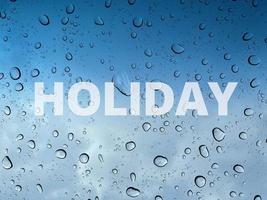 Happy Holidays, holiday planner Text with rain drop, water droplets and blue sky background