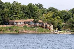 The Thousand Islands is an archipelago of islands that stretch along the border of Canada and the United States along the St. Lawrence River. photo