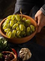 A shot of grapes in a bowl photo