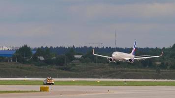 MOSCOW, RUSSIAN FEDERATION JULY 29, 2021 - Boeing 737 of Aeroflot landing at Sheremetyevo airport, side view. Tourism and travel concept, air flight video
