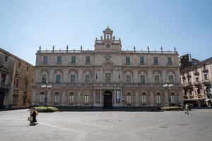 Facade of historic building of university at city square with sky in background photo