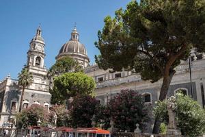 Bell tower and cupola of Catania baroque cathedral Saint Agata during summer photo