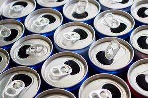 Empty aluminium drink cans recycling background concept photo