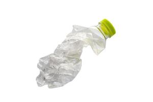 Crushed plastic bottle isolated on white background with clipping path photo