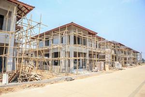 house under construction with autoclaved aerated concrete block structure at building site photo