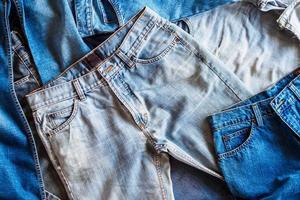 many denim blue jeans background photo