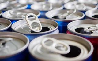 Empty aluminium drink cans recycling background concept photo