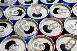 Empty aluminium drink cans recycling background concept photo