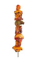 Grilled pork skewer and vegetables barbecue isolated on white background photo