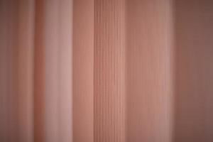 Texture pink blinds. Blinds on window. Protection from light. photo