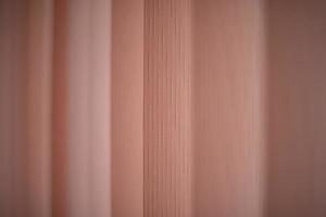 Texture pink blinds. Blinds on window. Protection from light. photo