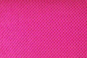 Bright pink knitwear wool fabric texture background. Abstract textile backdrop photo